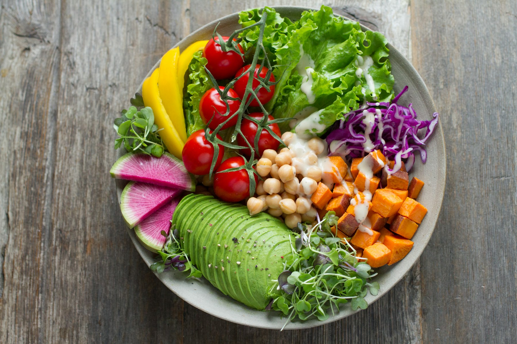 Colorful bowl of vegetables representing balanced, nutrient-dense eating.