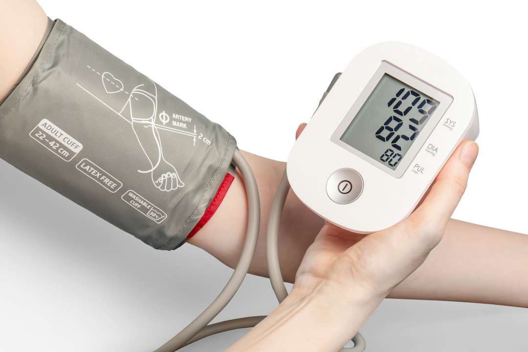 Home blood-pressure monitor, illustrating self-measured blood-pressure tracking and wellness follow-through.